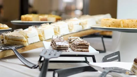 A Scrumptious and Varied Array of Tempting Desserts at a Buffet Stock Footage 316523899