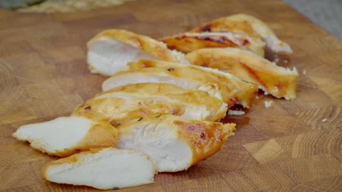 Scrumptious Grilled Chicken Slices Displayed On Wooden Platter Stock Footage 325840742