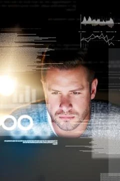 Scrutinizing the code. Shot of a focussed computer programmer working at his Stock Photos