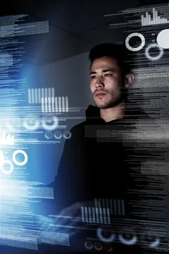 Scrutinizing his code. Shot of a focussed computer programmer working at his  Stock Photos