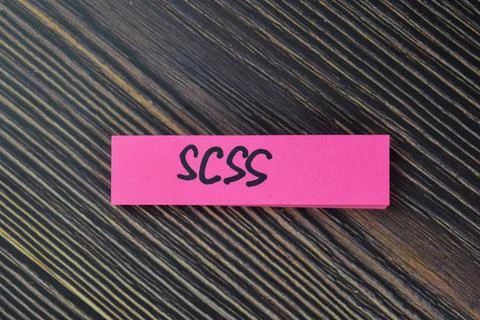 SCSS write on sticky notes isolated on Wooden Table. Foto stock