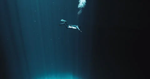 A Scuba Diver and Light Rays in Yucatan Stock Footage 270117615