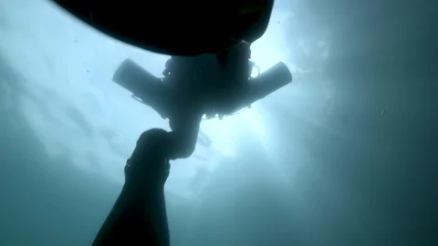Scuba diver from below who is going to the surface, Albano lake, Italy Stock Footage 107570697