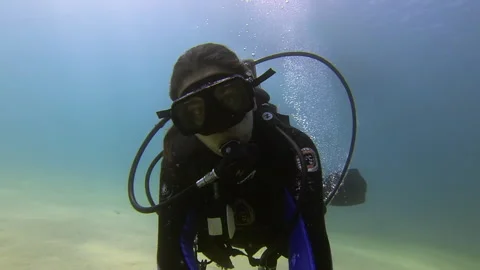 Scuba diver in the bottom Stock Footage 157992656