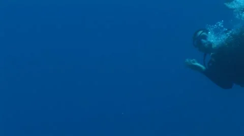Scuba Diver Up Close with Scooter Stock Footage 5254602
