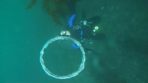 Scuba Diver Creates Bubble Rings Stock Footage 129260603