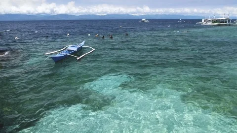Scuba diver with diving boat in Philippines Stock Footage 97102011