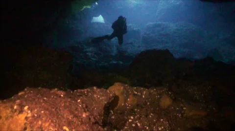 Scuba diver explores under water cave, mediterranean sea Video stock 43216235