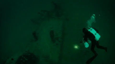 Scuba Diver Exploring Wreck Stock Footage 20440663