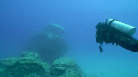Scuba Diver is Going to the Ship Wreck Underwater Stock Footage 121878156