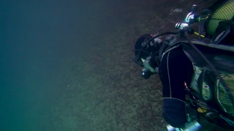 Scuba Diver Pass the Camera Deep Underwater Stock Footage 143691959