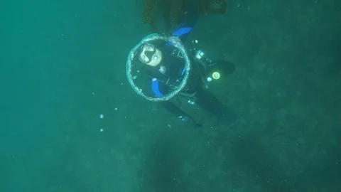 Scuba Diver Shapes Perfect Bubble Rings Stock Footage 129260417