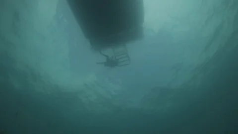 Scuba diver silhouette returning to boat 스톡 동영상 80439640