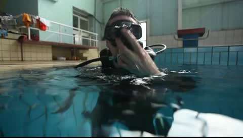 Scuba diver in swimming pool Stock Footage 10700795
