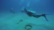 Scuba Diver Taking A Photo With Divers Underwater Stock Footage