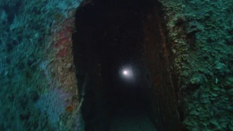 Scuba divers exploring the the USS Spiegel Grove wreck Stock-Footage 80432379
