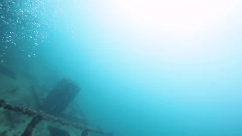 Scuba divers exploring the USS Spiegel Grove wreck Stock Footage 80438301