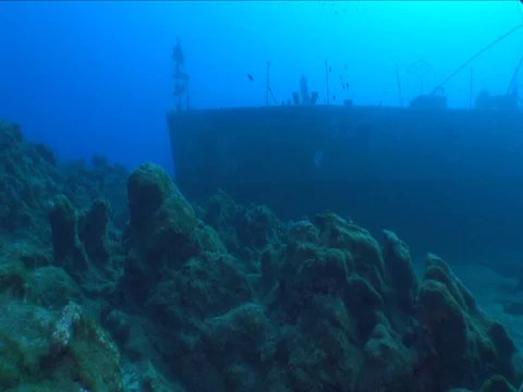 Scuba divers geting in ship wreck and close underwater shipwreck Stock Footage 101356700