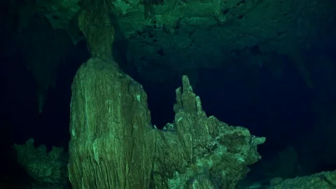 Scuba diving inside Cenote Carwash cave system in Yucatan Peninsula Mexico Stock Footage 166512973