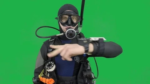Scuba diving instructor shows signal – swimming 動画素材 123382411