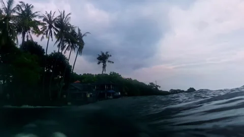 Scuba Diving Surface View Near Tropical Coastline in Bali Stock Footage 334183993