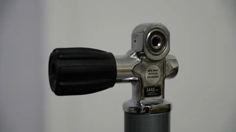 Scuba Diving Tank Valve Close-Up. Camera panning Stock Footage 328963973