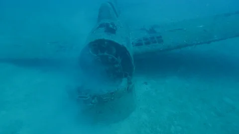 Scuba diving on world war 2 wreckage. Shot in the Solomon Islands. Stock Footage 93429218