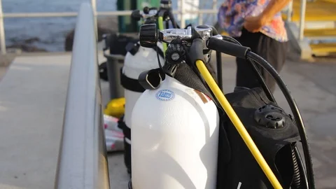 Scuba equipment in the process of being set up for a scuba dive Stock Footage 102148149
