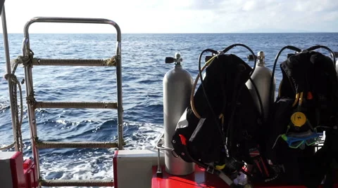 Scuba oxygen gas tanks with diving line equipment on boat ready to diving trip Stock Footage 53445978