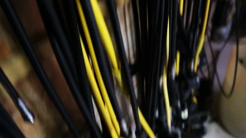 Scuba regulators hang on wall in dive shop Video stock 87374434