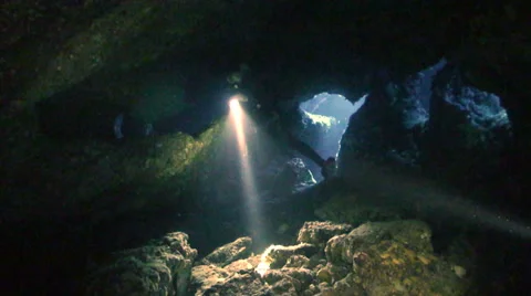 Scubadiver exploring underwater  cave Stock Footage 42888749