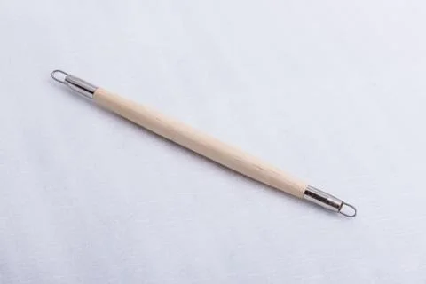 A sculpting tool on a white surface Stock Photos