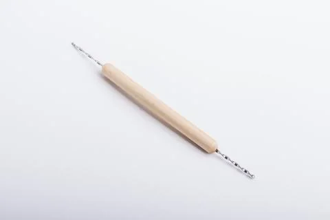A sculpting tool on a white surface Stock Photos