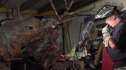 A sculptor arc working on his statue Stock Footage 53778447