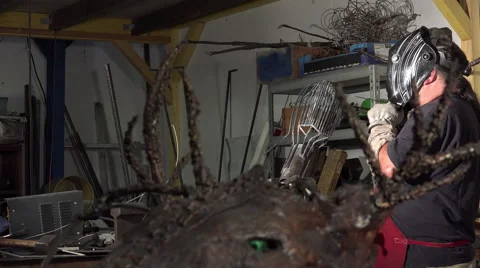A sculptor arc working on his statue Stock Footage 53780534