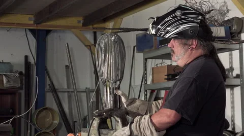 A sculptor arc working on his statue Stock Footage 53784797