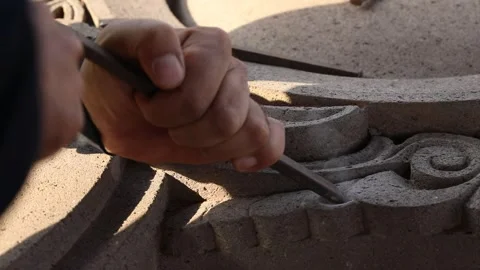 The sculptor is carving stone 10 Stock Footage 323817537