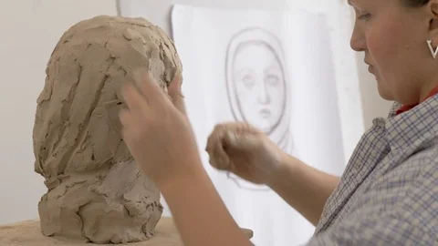 A sculptor creates a sculpture. Stock Footage 83132386