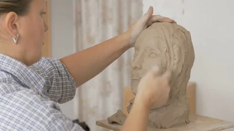 A sculptor creates a sculpture. Stock Footage 83132933