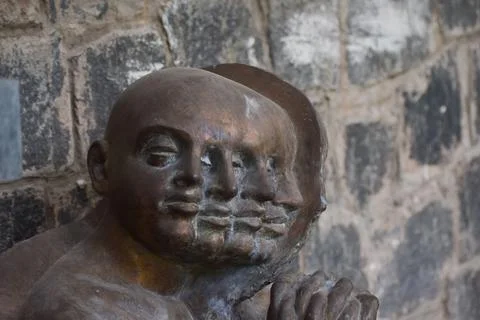 Sculptor with human face Stock Photos