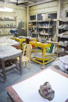A sculptor making studio Stock Photos