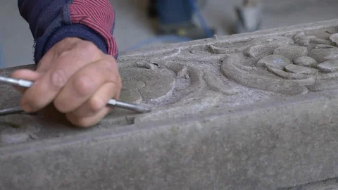 Sculptor modelling marble with a scalpel Stock Footage