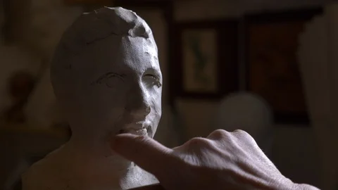 Sculptor models a clay statue Stock Footage 119429681