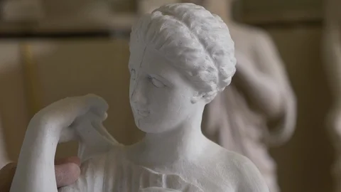 Sculptor refine a marble statue with a file 動画素材 119430384