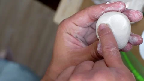 Sculptor s Touch  Close Up of Hands Shaping White Clay Stock Footage 260842845