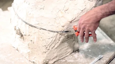 Sculptor is working on the creation of a monument Stock Footage 75459272
