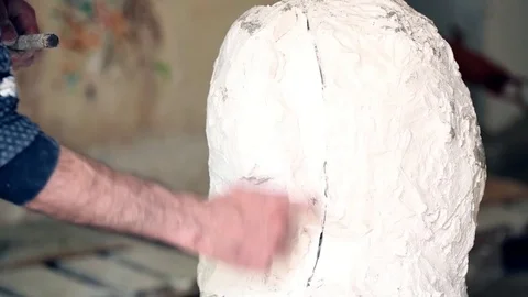 Sculptor is working on the creation of a monument Stock Footage 75459300
