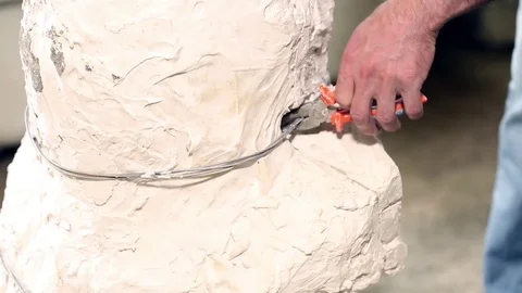 Sculptor is working on the creation of a monument Stock Footage 75459378