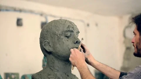 Sculptor is working on the creation of a monument Stock Footage 75459405