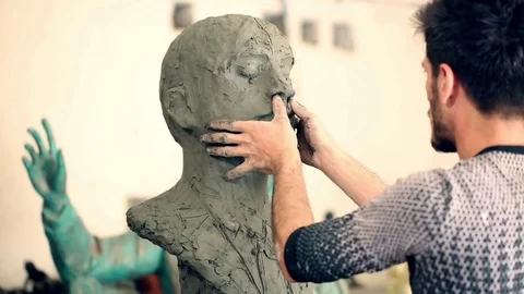 Sculptor is working on the creation of a monument Stock Footage 75459424